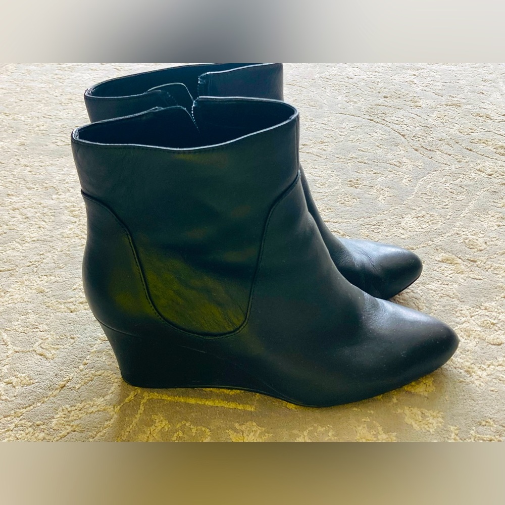 Black Leather boots pointed toes size 11 gently worn.